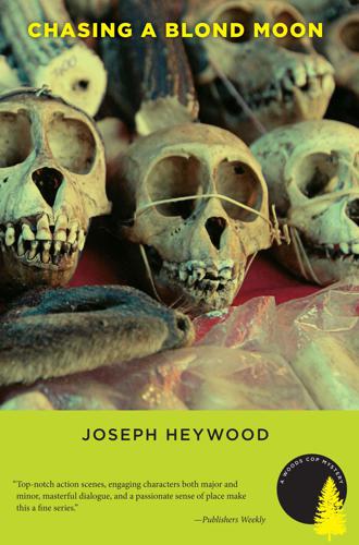 Chasing a Blond Moon: a Woods Cop Mystery